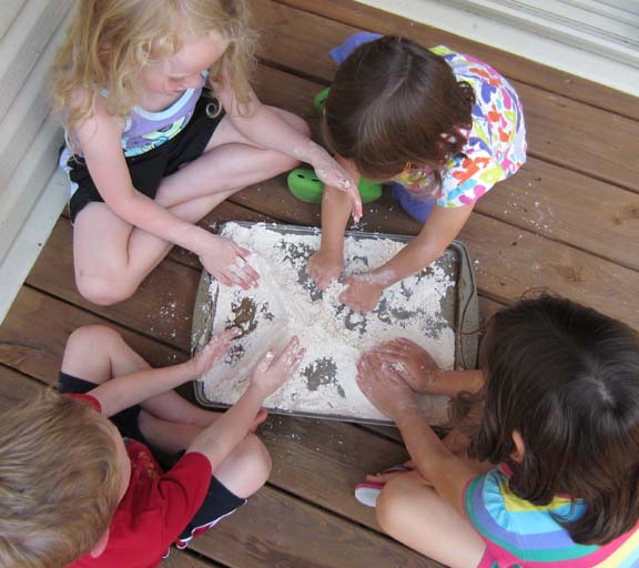 kids playing with cloud dough